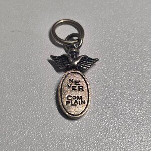 Waxing Poetic Sterling Silver Spinner Charm